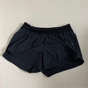Excellent used condition. Womens Lululemon Tracker Shorts. Sz 8. Black. No tag.
